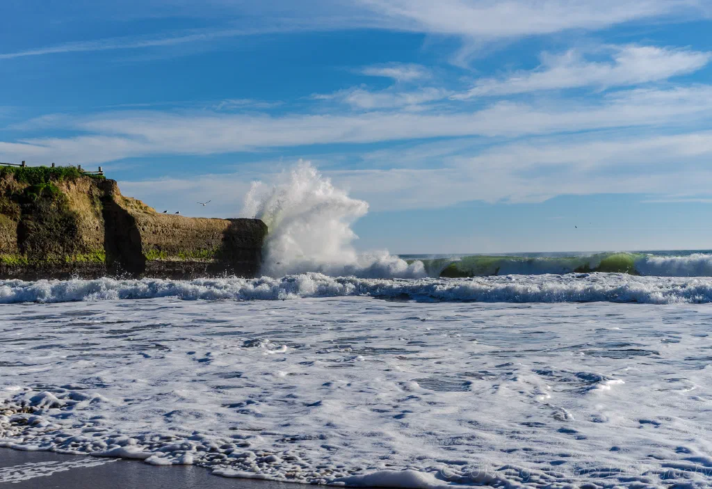 Waves hit the rock